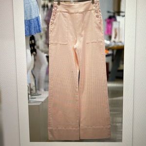 Alice + Olivia Donald Button Trim High Waist petal pink wide leg jeans. NWT